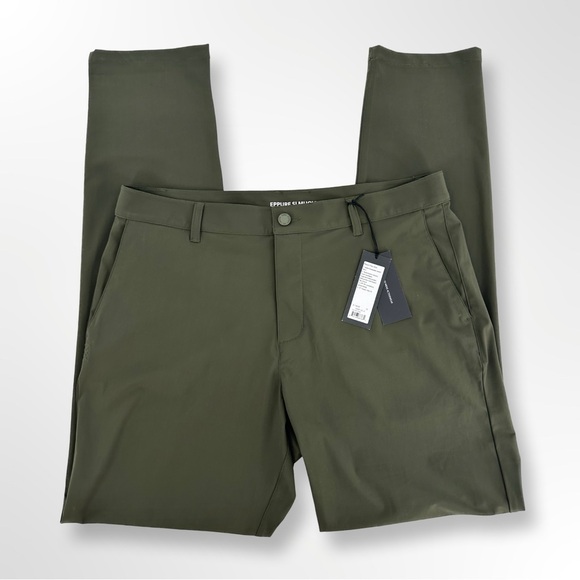 NEW Rhone Resort Pant Stretch Slim Fit Travel Quick Dry 35 x 33 Survivor Green - Picture 1 of 7